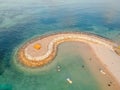 Aerial drone view of ocean, boats, beach, shore In Sanur Beach, Bali, Indonesia with with Traditional Balinese Fishing Boats Royalty Free Stock Photo