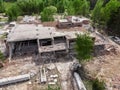 Aerial drone view of old demolished industrial building. Pile of concrete and brick rubbish, debris, rubble and waste of Royalty Free Stock Photo