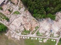 Aerial drone view of old demolished industrial building. Pile of concrete and brick rubbish, debris, rubble and waste of Royalty Free Stock Photo