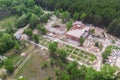 Aerial drone view of old demolished industrial building. Pile of concrete and brick rubbish, debris, rubble and waste of