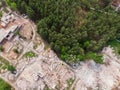 Aerial drone view of old demolished industrial building. Pile of concrete and brick rubbish, debris, rubble and waste of Royalty Free Stock Photo