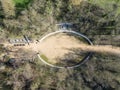 Aerial drone view over the ancient Roman amphitheater ruins at Augusta Raurica in Kaiseraugst.