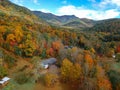 Aerial Drone view of overhead colorful fall / autumn leaf foliage near Asheville, North Carolina.Vibrant red, yellow, teal, orange Royalty Free Stock Photo