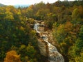 Aerial Drone view of overhead colorful fall / autumn leaf foliage near Asheville, North Carolina.Vibrant red, yellow, teal, orange Royalty Free Stock Photo