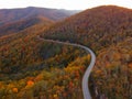 Aerial Drone view of overhead colorful fall / autumn leaf foliage near Asheville, North Carolina.Vibrant red, yellow, teal, orange Royalty Free Stock Photo