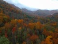 Aerial Drone view of overhead colorful fall / autumn leaf foliage near Asheville, North Carolina.Vibrant red, yellow, teal, orange Royalty Free Stock Photo