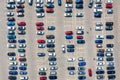 Aerial drone view of a parking lot with many cars near supermarket Royalty Free Stock Photo