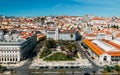 Aerial drone view of people relaxing at Dom Luis Garden in the Baixa District of Lisbon, Portugal on a warm spring day with Royalty Free Stock Photo