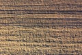 Aerial drone view of a plowed field