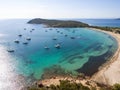 Aerial drone view of Rondinara Bay Beach Corsica with boats Royalty Free Stock Photo