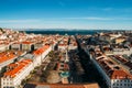 Aerial drone view of Rossio square, with the Tagus river in background in the Baixa district of Lisbon, Portugal