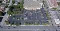 Aerial drone view of safeway grocery store with parking lot