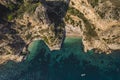 Aerial drone view on secret cozy beach sheltered between two rocky headlands Cala Moraig, Valencia community, Spain