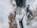 Aerial drone view of Skogafoss waterfall in winter with blue sky and colourful orange grass. Royalty Free Stock Photo