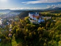 Aerial drone view of Slovenska Lupca castle during autumn sunset