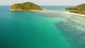 Aerial drone view small Koh Ma island, Ko Phangan Thailand. Exotic coast panoramic landscape, Mae Haad beach, summer day. Sandy Royalty Free Stock Photo