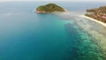 Aerial drone view small Koh Ma island, Ko Phangan Thailand. Exotic coast panoramic landscape, Mae Haad beach, summer day. Sandy Royalty Free Stock Photo