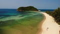 Aerial drone view small Koh Ma island, Ko Phangan Thailand. Exotic coast panoramic landscape, Mae Haad beach, summer day. Sandy Royalty Free Stock Photo