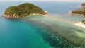 Aerial drone view small Koh Ma island, Ko Phangan Thailand. Exotic coast panoramic landscape, Mae Haad beach, summer day. Sandy Royalty Free Stock Photo