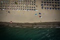 Aerial drone view of Spille beach in Albania with pine forest