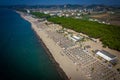 Aerial drone view of Spille beach in Albania with pine forest