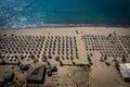 Aerial drone view of Spille beach in Albania with pine forest