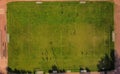 Aerial drone view from the sport center during the training of the football team. Players are playing a soccer match Royalty Free Stock Photo