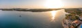 Aerial drone view of sunset over Kornati islands near the Sibenik city, Croatia. Water bay with boats ans soft sun light Royalty Free Stock Photo