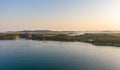 Aerial drone view of sunset over Kornati islands near the Sibenik city, Croatia. Water bay with boats ans soft sun light Royalty Free Stock Photo