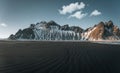 Aerial drone view of sunset runrise and gorgeous reflection of Vestrahorn mountain on Stokksnes cape in Iceland Royalty Free Stock Photo