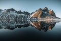 Aerial drone view of sunset runrise and gorgeous reflection of Vestrahorn mountain on Stokksnes cape in Iceland Royalty Free Stock Photo