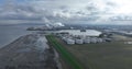 Aerial drone view on the tank terminal of Terneuzen and the chemical park in the background. Production of plastics
