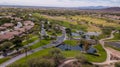 Aerial drone view of the Trilogy Golf Club on a sunny day