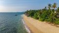 Aerial drone view of tropical beach from above, sea, sand and palm trees island beach landscape, Lanta, Thailand