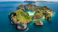 Aerial drone view of tropical Ko Phi Phi island, beaches and boats in blue clear Andaman sea water from above, Thailand