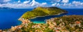 Aerial drone view video of beautiful and picturesque colorful traditional fishing village of Assos in island of Cefalonia, Ionian Royalty Free Stock Photo