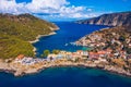 Aerial drone view video of beautiful and picturesque colorful traditional fishing village of Assos in island of Cefalonia, Ionian Royalty Free Stock Photo