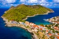 Aerial drone view video of beautiful and picturesque colorful traditional fishing village of Assos in island of Cefalonia, Ionian Royalty Free Stock Photo