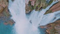 Aerial drone view of the waterfall, turquoise water and rocky shore. Wildlife. The element of water.