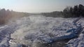 Aerial drone view winter landscape stream in gorge Arshan, Siberia, Buryatia.