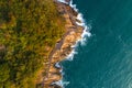 Aerial drone view of wooden boardwalk and sea waves Royalty Free Stock Photo