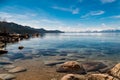 Lake Tahoe amazing sunrise deep blue water and snow capped mountains Royalty Free Stock Photo