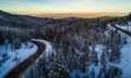 Aerial drone views of Sunset and Winding Mountain Road high in the Mountains