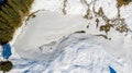 Aerial drop down view of frozen lake. Royalty Free Stock Photo