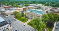 Aerial entrance view in summer of Auburn courthouse