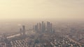 Aerial shot of Moscow involving skyscrapers of the financial district and the western part of the city on a hazy day Royalty Free Stock Photo