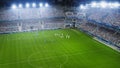 Aerial Establishing Shot of a Whole Stadium with Soccer Championship Match. Teams Play and Crowd of