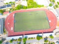 Aerial Establishing Shot of a Whole Stadium with Soccer Championship Match. Teams Play, Crowd of Fans Cheer. Football Tournament,