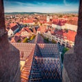 Aerial evening view of Altemberger House - Sibiu History Museum. Colorful cityscape of Sibiu town.