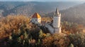 Aerial fall view of old stone Kokorin Castle built in 14th century.It lies in the middle of nature reserve on a steep rocky spur